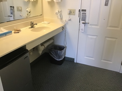 Picture of sink area in single queen room